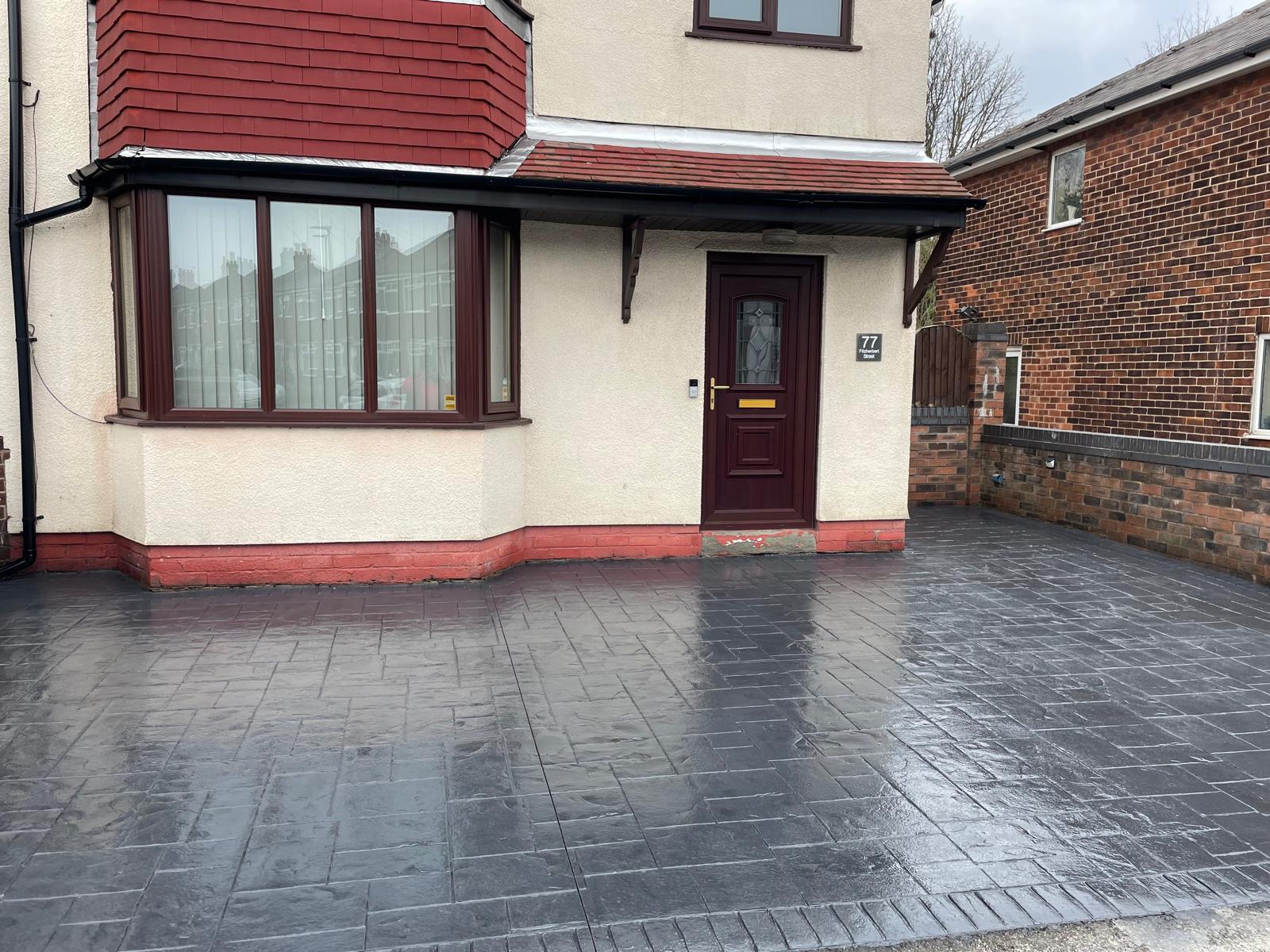 Charcoal imprinted concrete driveway, premium dark finish, Warrington