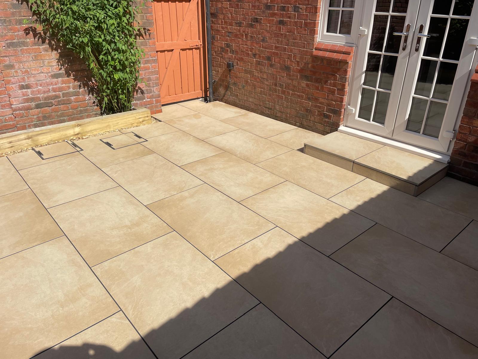 Sand porcelain tiled patio with warm natural stone effect, Warrington
