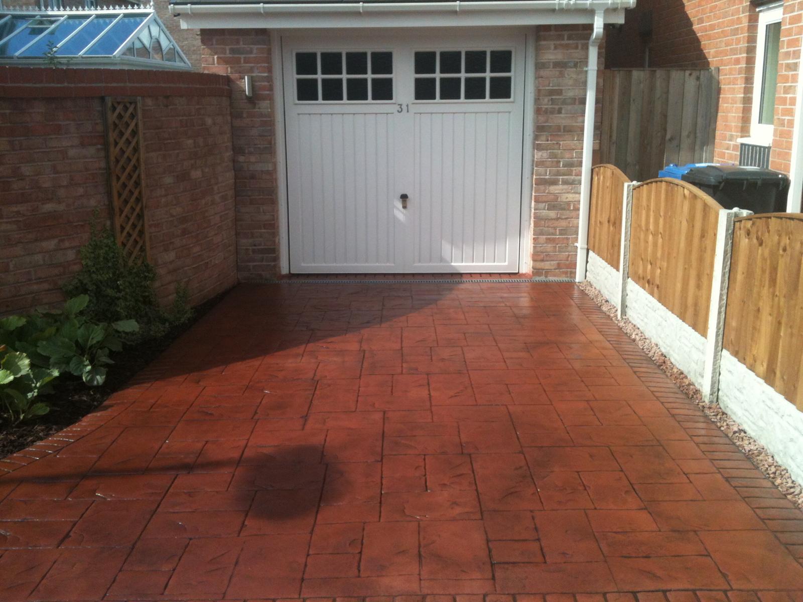 Brick effect terracotta imprinted concrete driveway to garage, Warrington